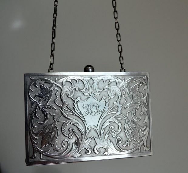 http://www.onlineauction.com/auction/1953424/Victorian-sterling-calling-card--purse.